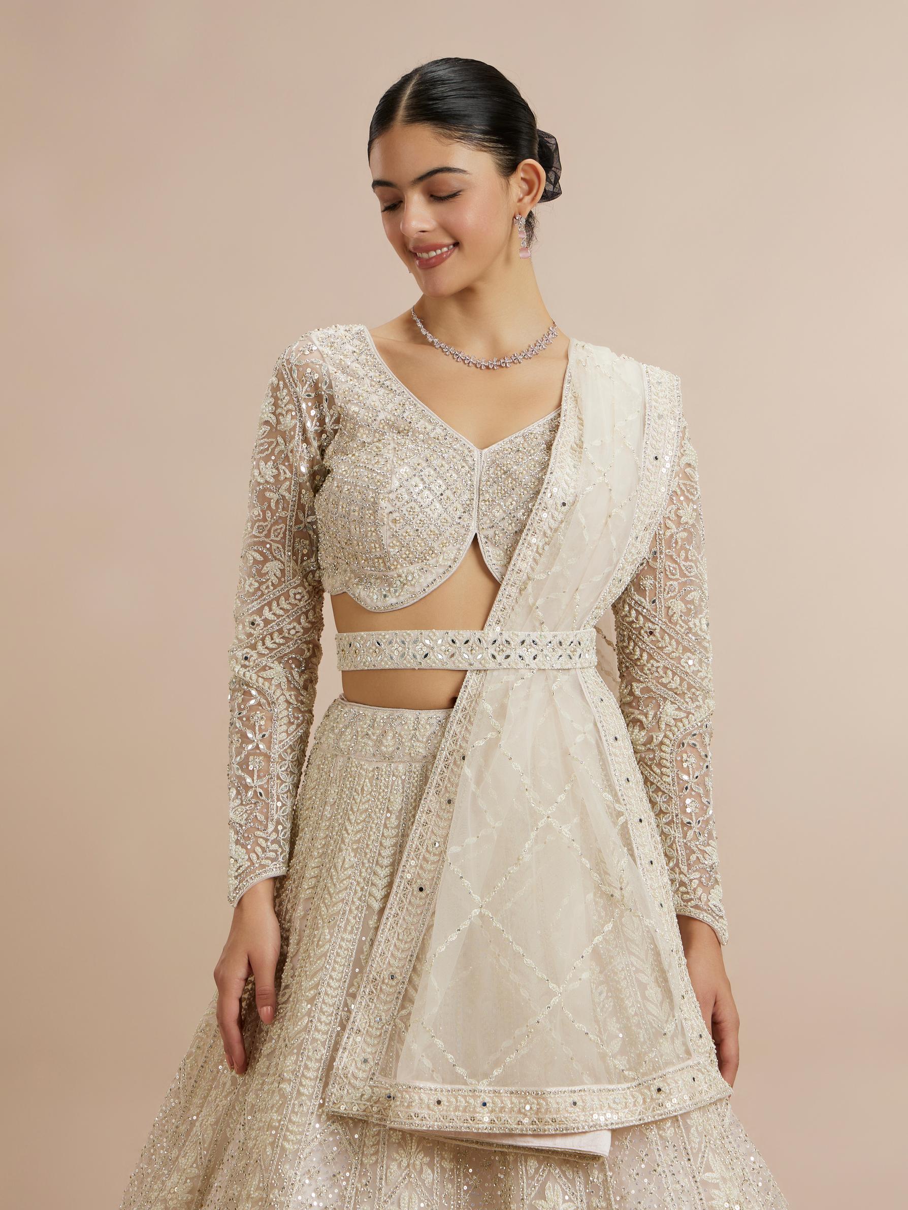 Twamev Women Ravishing Cream Lehenga Ensemble