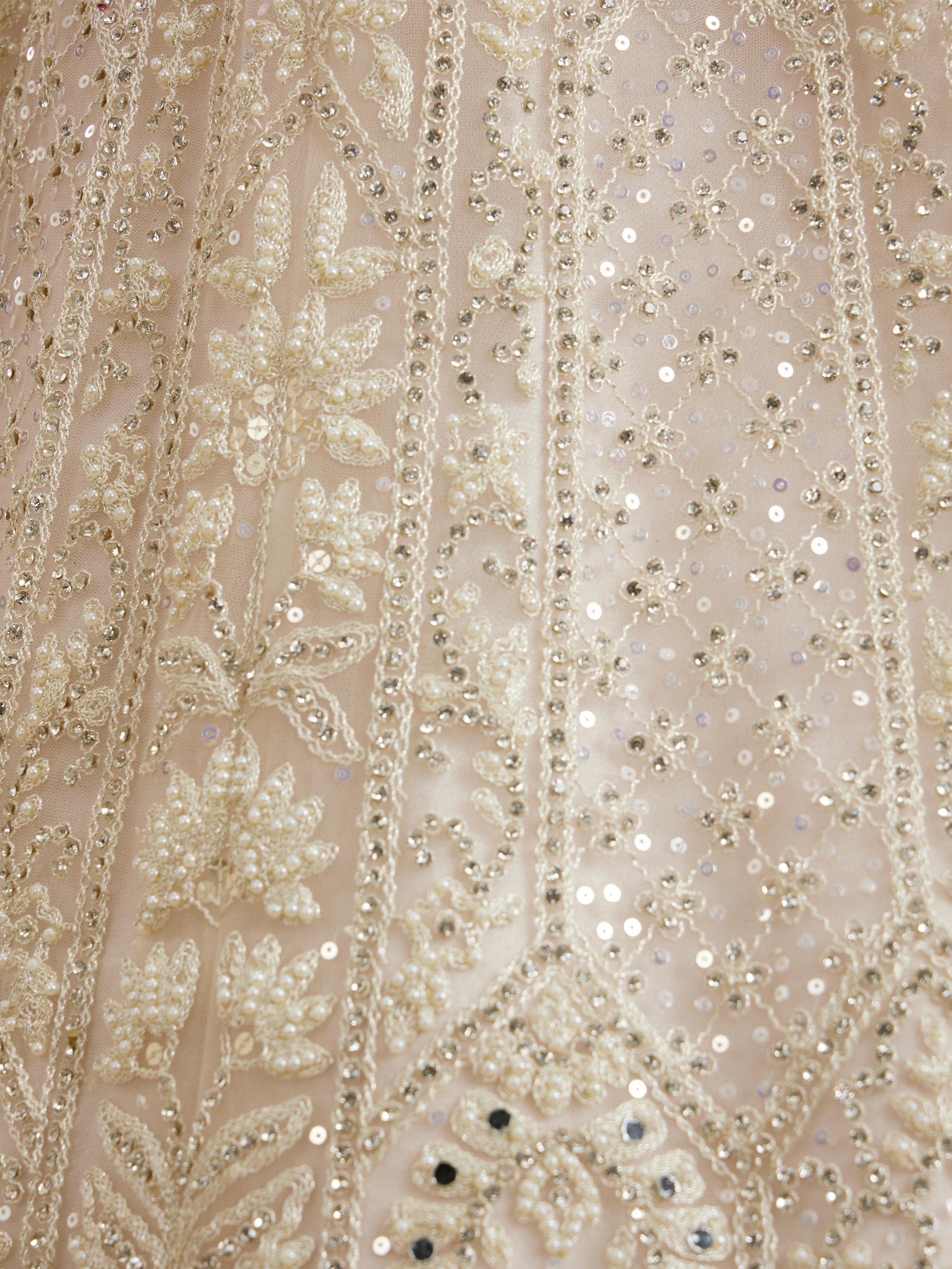 Twamev Women Ravishing Cream Lehenga Ensemble