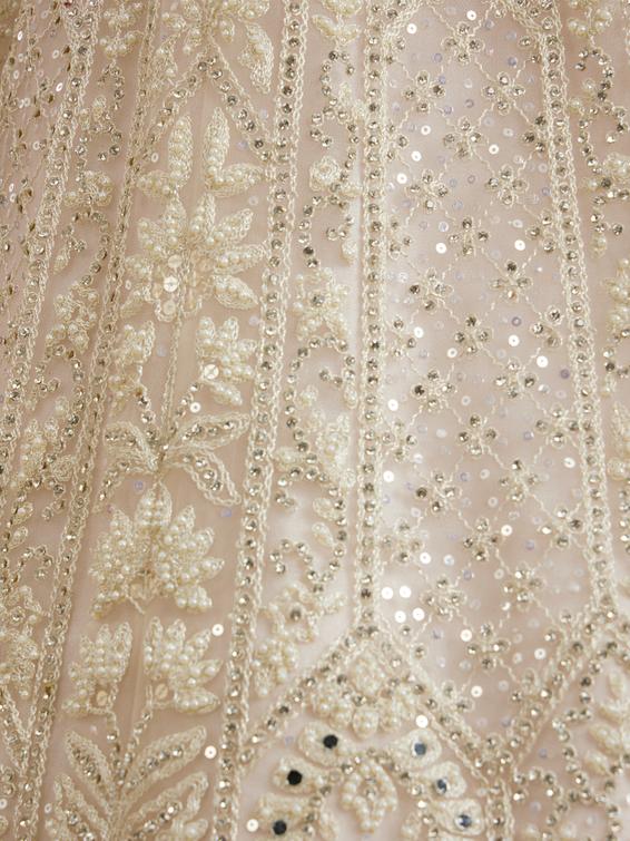 Twamev Women Ravishing Cream Lehenga Ensemble
