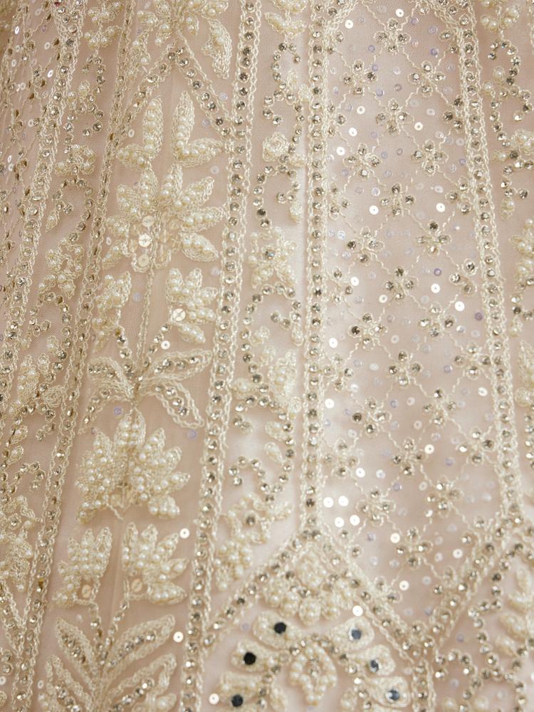 Twamev Women Ravishing Cream Lehenga Ensemble