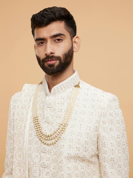 Twamev Men Warm White Grid Patterned Sherwani Set with Sequin Embellishments
