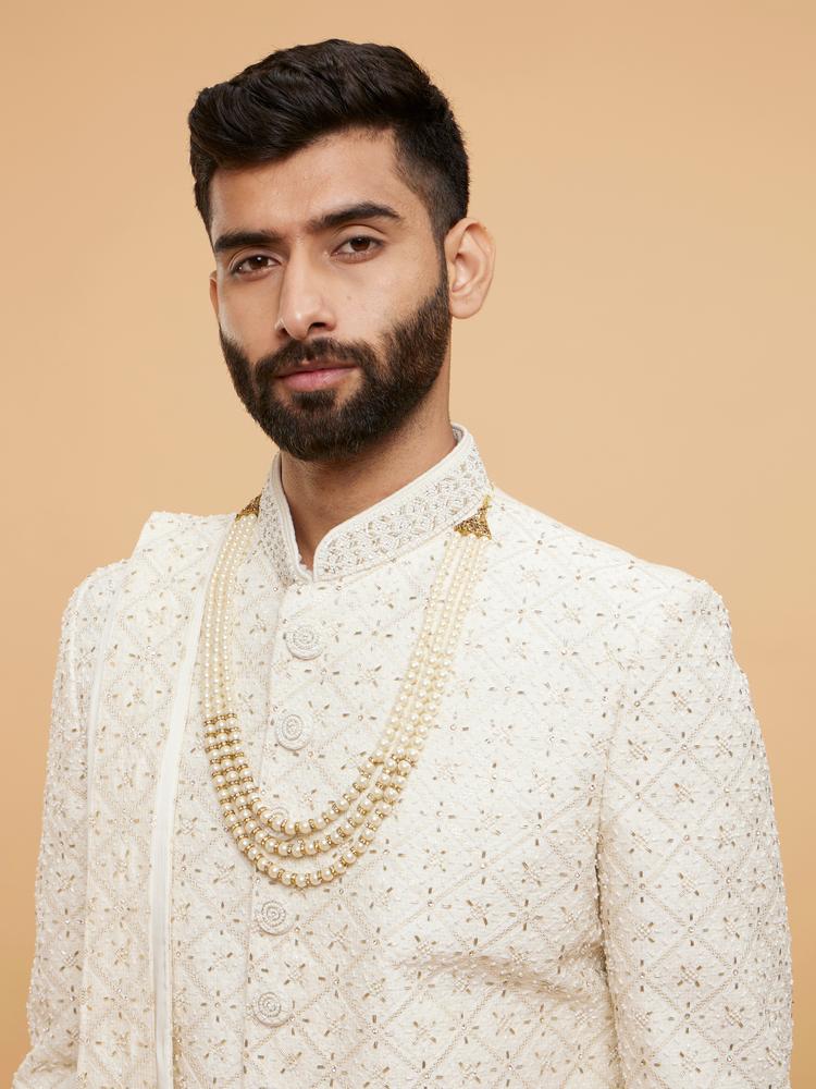 Twamev Men Warm White Grid Patterned Sherwani Set with Sequin Embellishments
