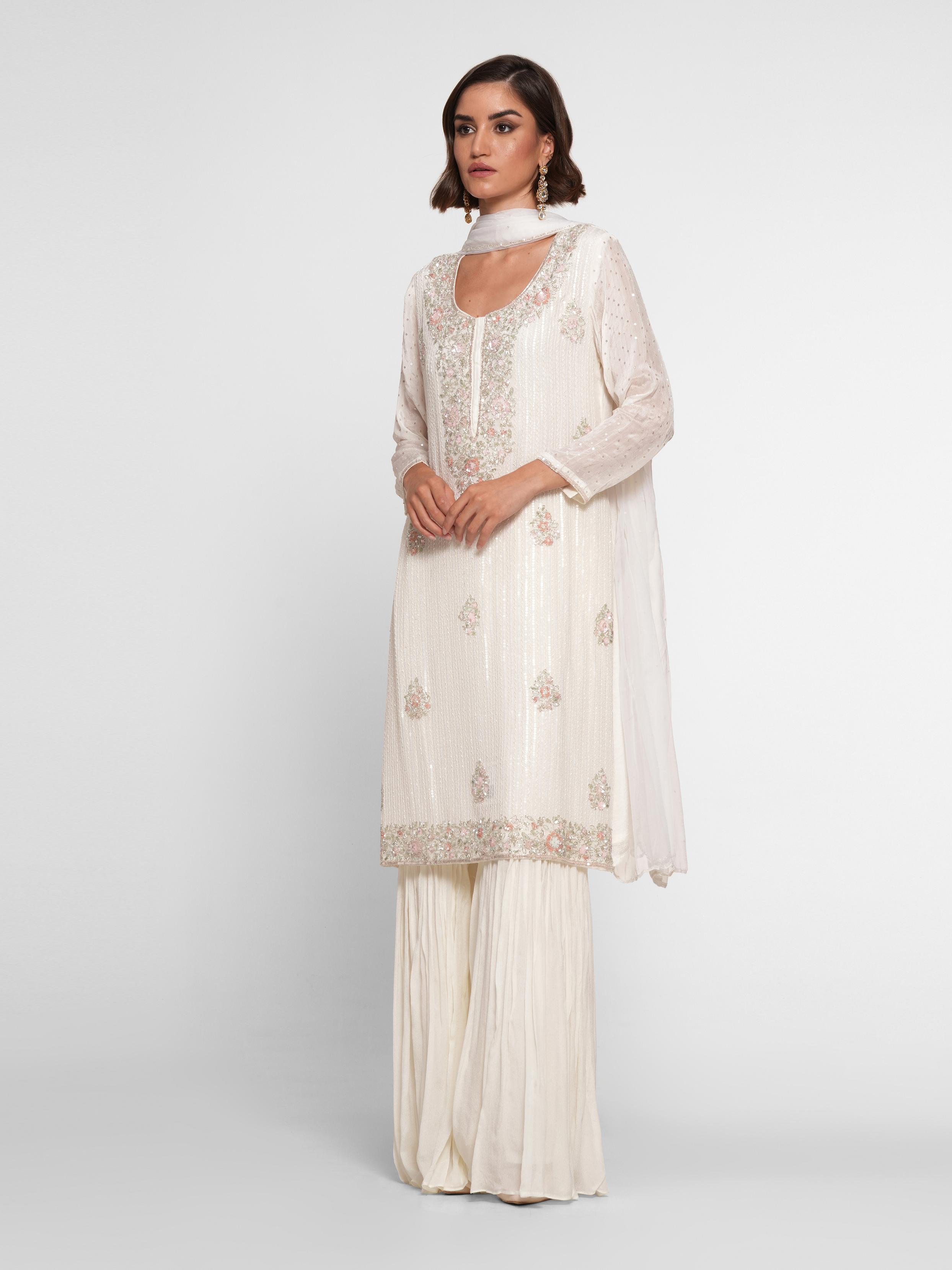 Twamev Women Cream Chinon Stitched Suit with Cutdana Work