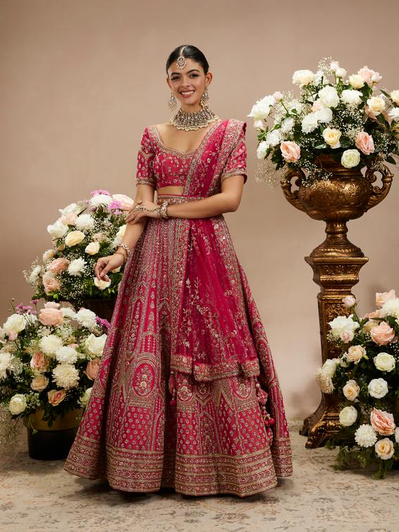 Twamev Women Rani Pink Zari Embroidered Lehenga with Floral And Buta Motifs And Pillow Trim Latkans
