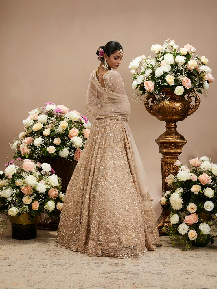 Twamev Women Honey Peach Jaal Patterned Lehenga with Floral Buta Motifs And Sequin And Stone Work