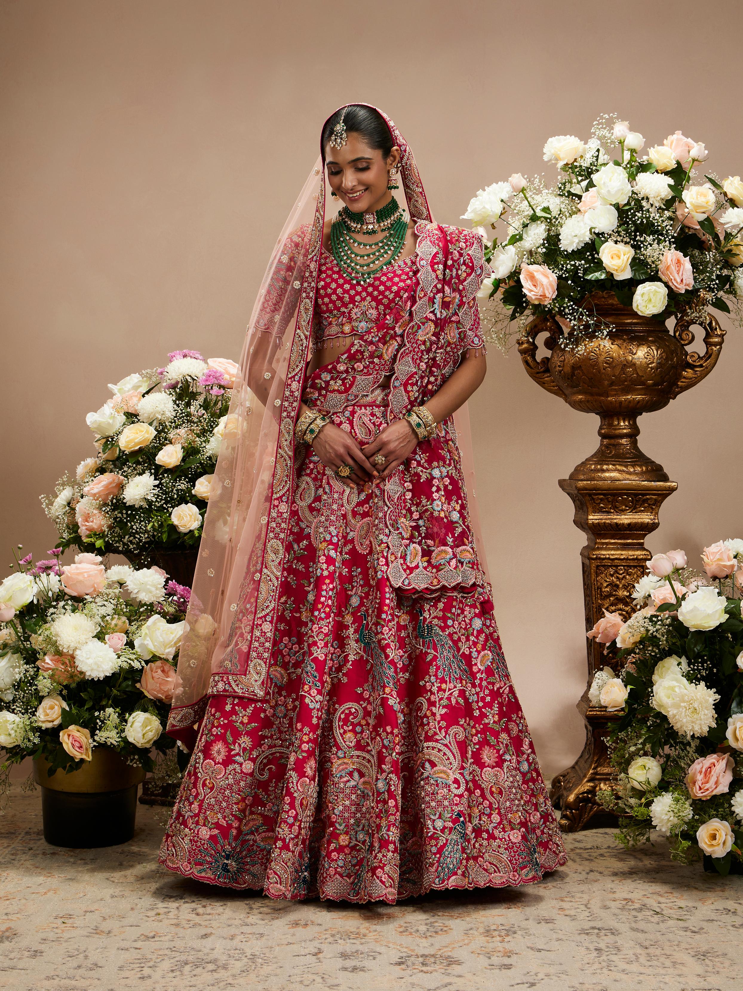 Twamev Women Carmine Red Floral Embroidered Sequinned Lehenga with Paisley And Peacock Motifs