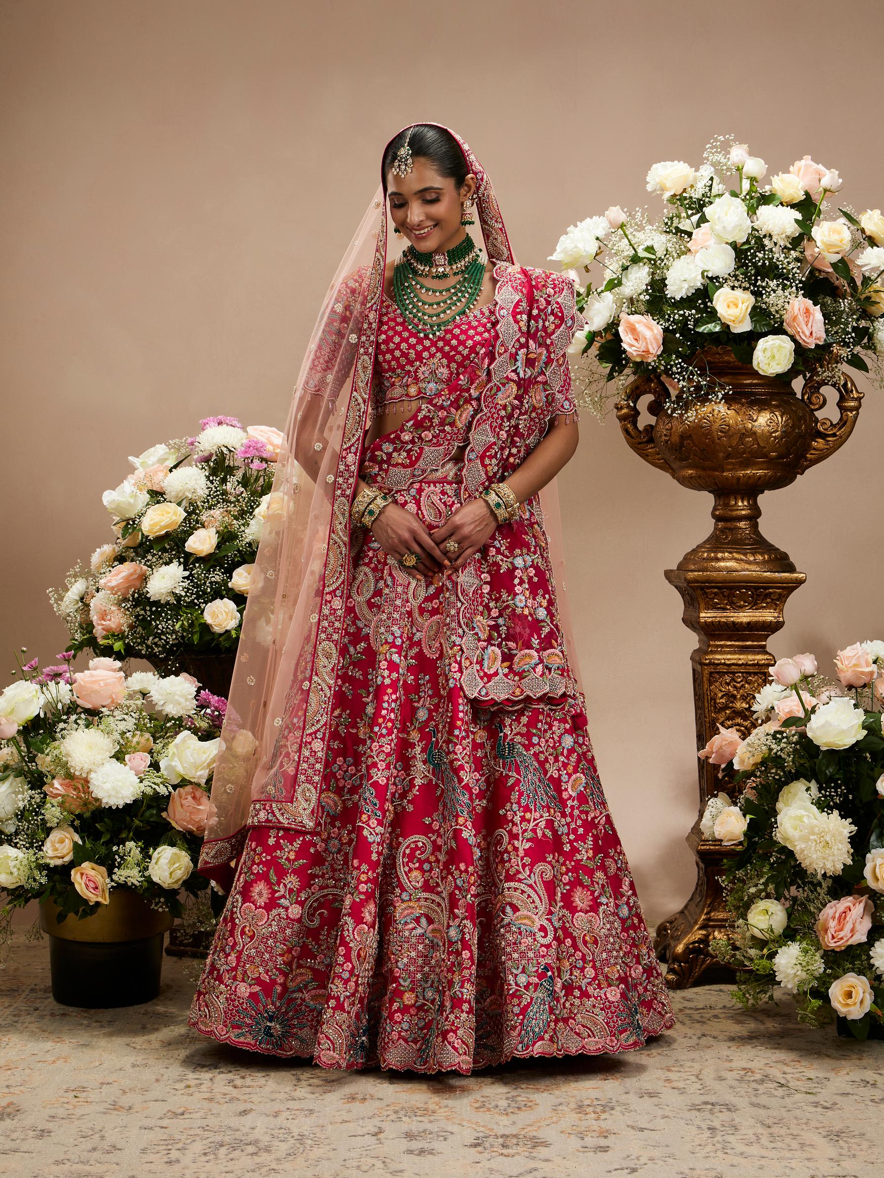 Twamev Women Carmine Red Floral Embroidered Sequinned Lehenga with Paisley And Peacock Motifs
