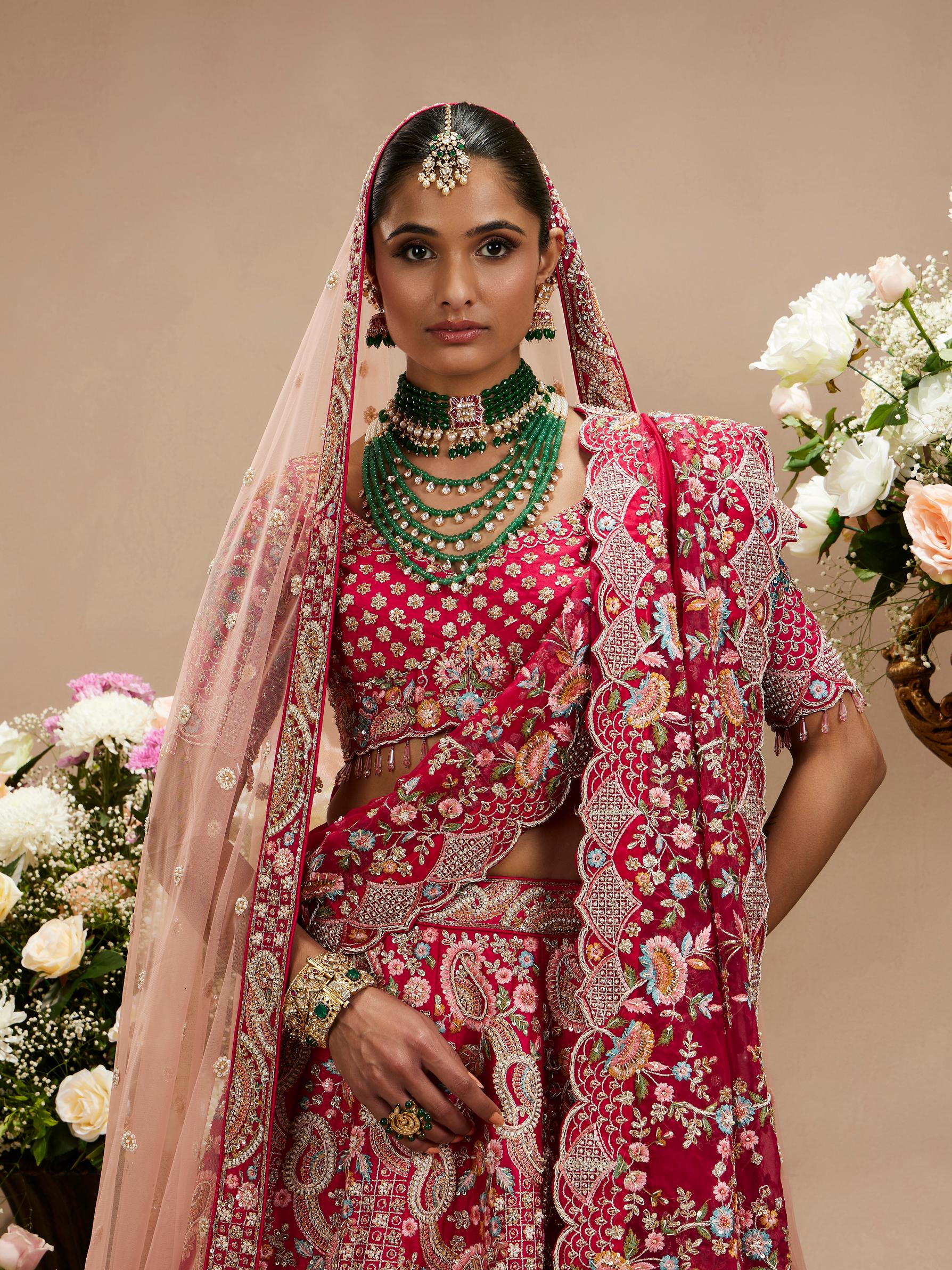Twamev Women Carmine Red Floral Embroidered Sequinned Lehenga with Paisley And Peacock Motifs