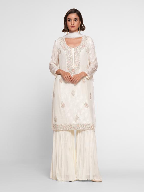Twamev Women Cream Chinon Stitched Suit with Cutdana Work