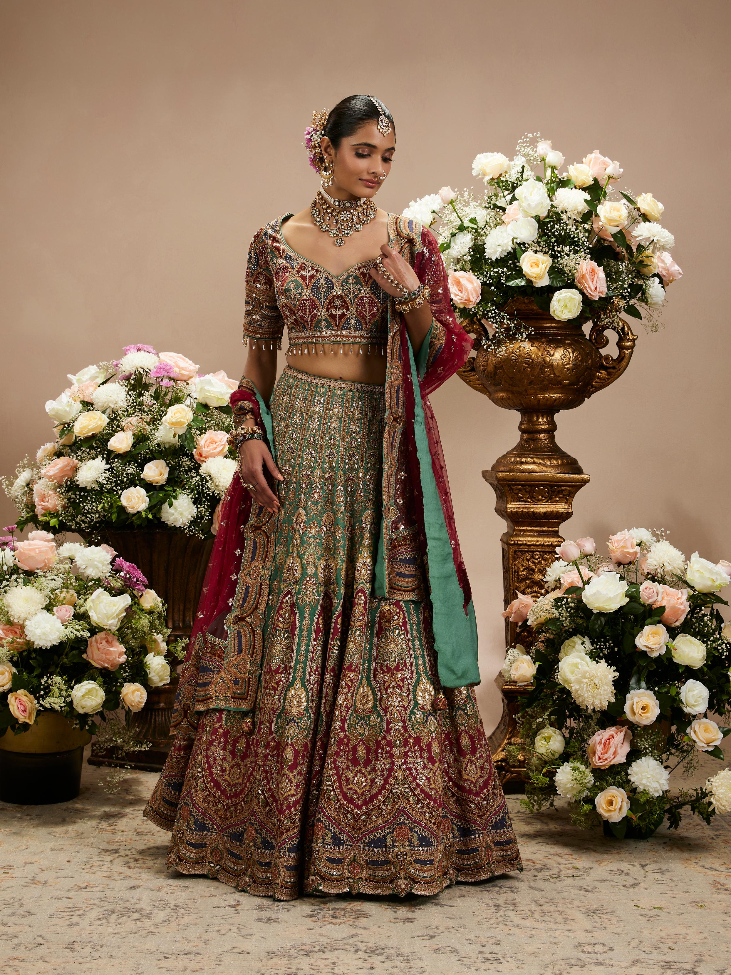Twamev Women Rama Green And Maroon Jhallar Patterned Lehenga with Buta Motifs, Zari And Gota Patti Work