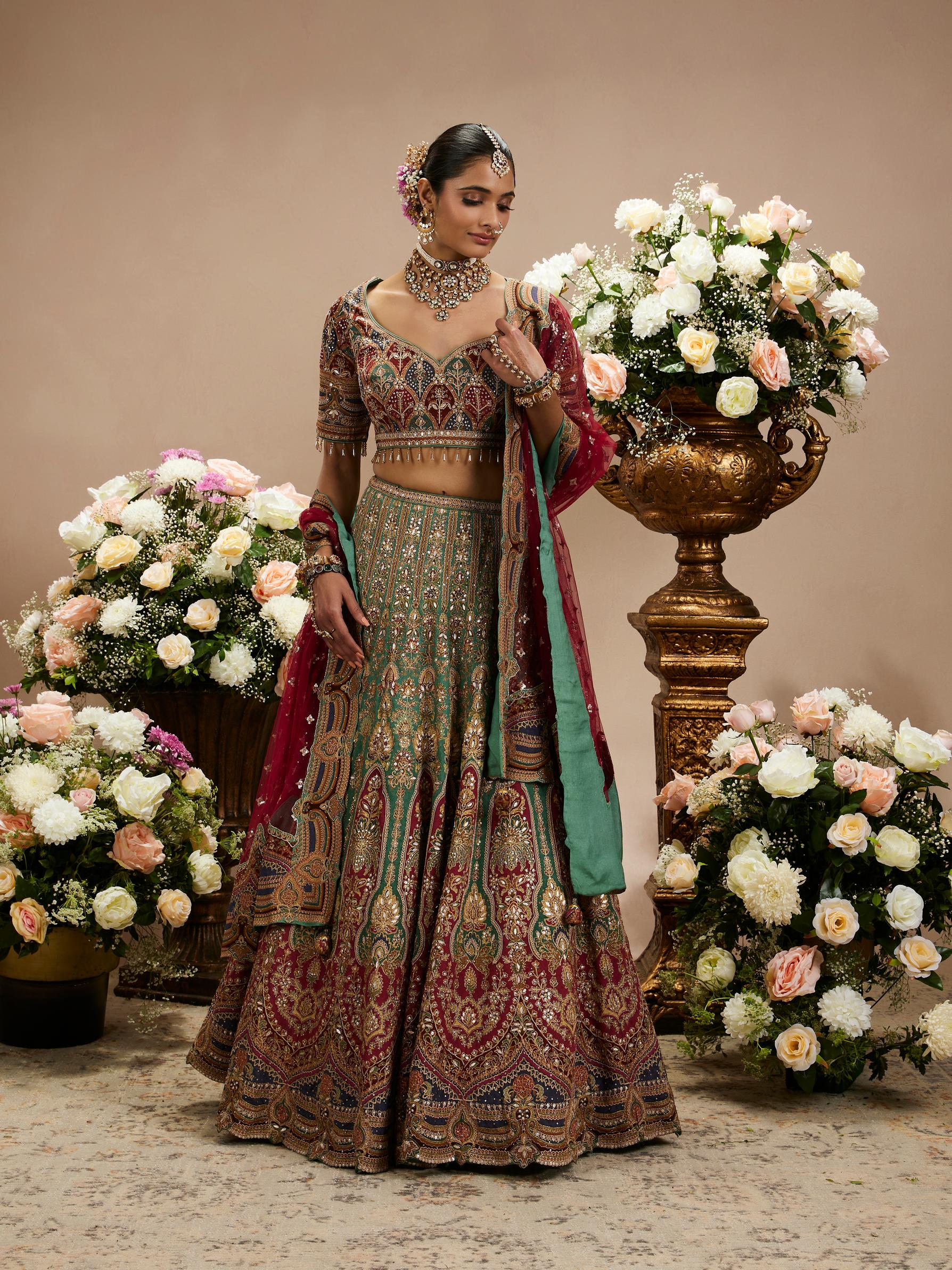 Twamev Women Rama Green And Maroon Jhallar Patterned Lehenga with Buta Motifs, Zari And Gota Patti Work