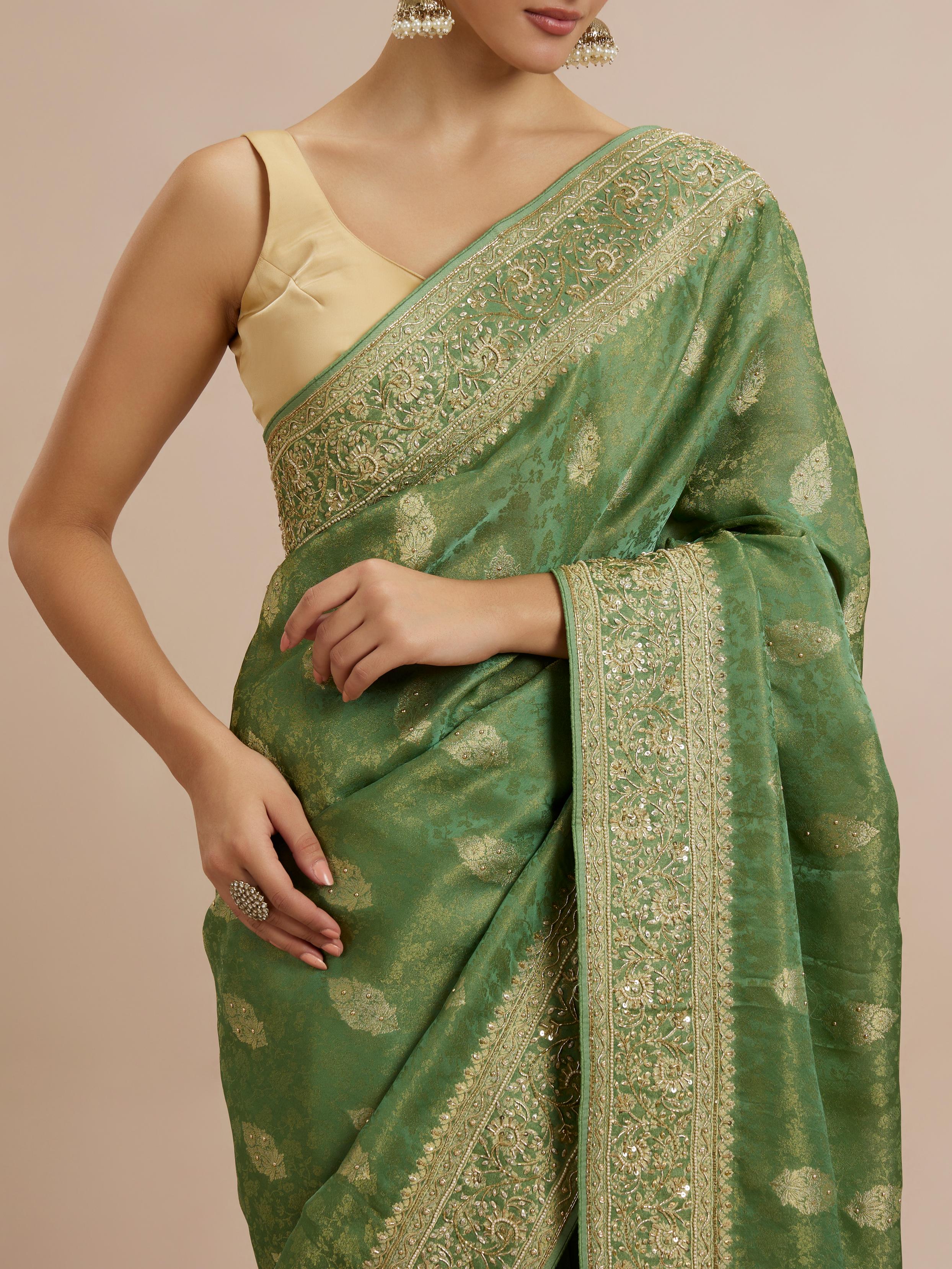 Twamev Women Enchanting Sea Green Satin Saree