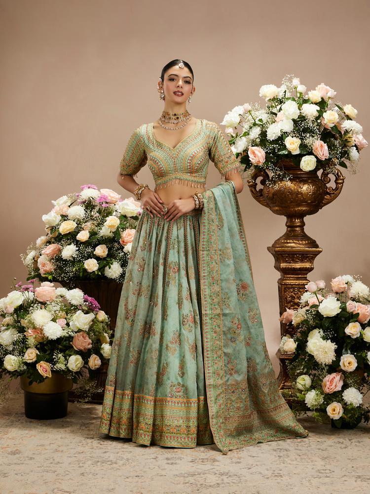 Twamev Women Sea Green Floral Embroidered Lehenga with Mirror Work And Tassled Blouse