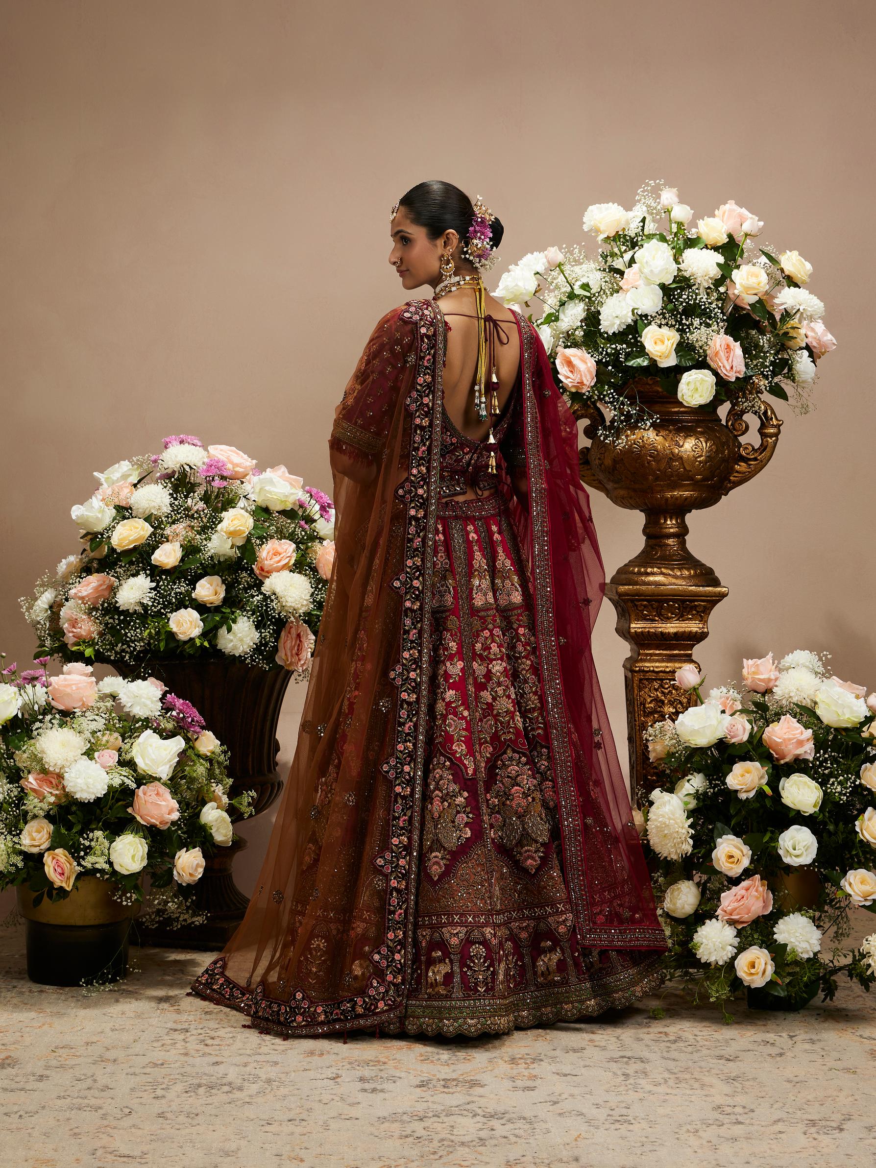 Twamev Women Maroon Red Jhallar Patterned Lehenga with Floral, Elephant Motifs And Sequin Work