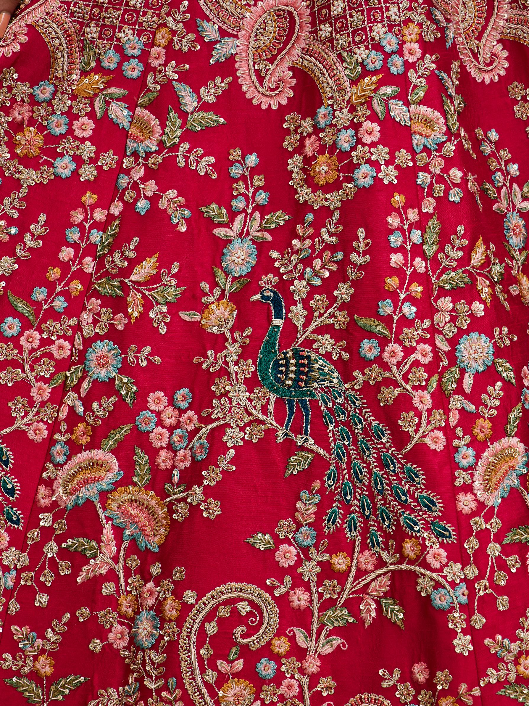 Twamev Women Carmine Red Floral Embroidered Sequinned Lehenga with Paisley And Peacock Motifs