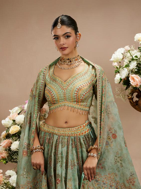 Twamev Women Sea Green Floral Embroidered Lehenga with Mirror Work And Tassled Blouse