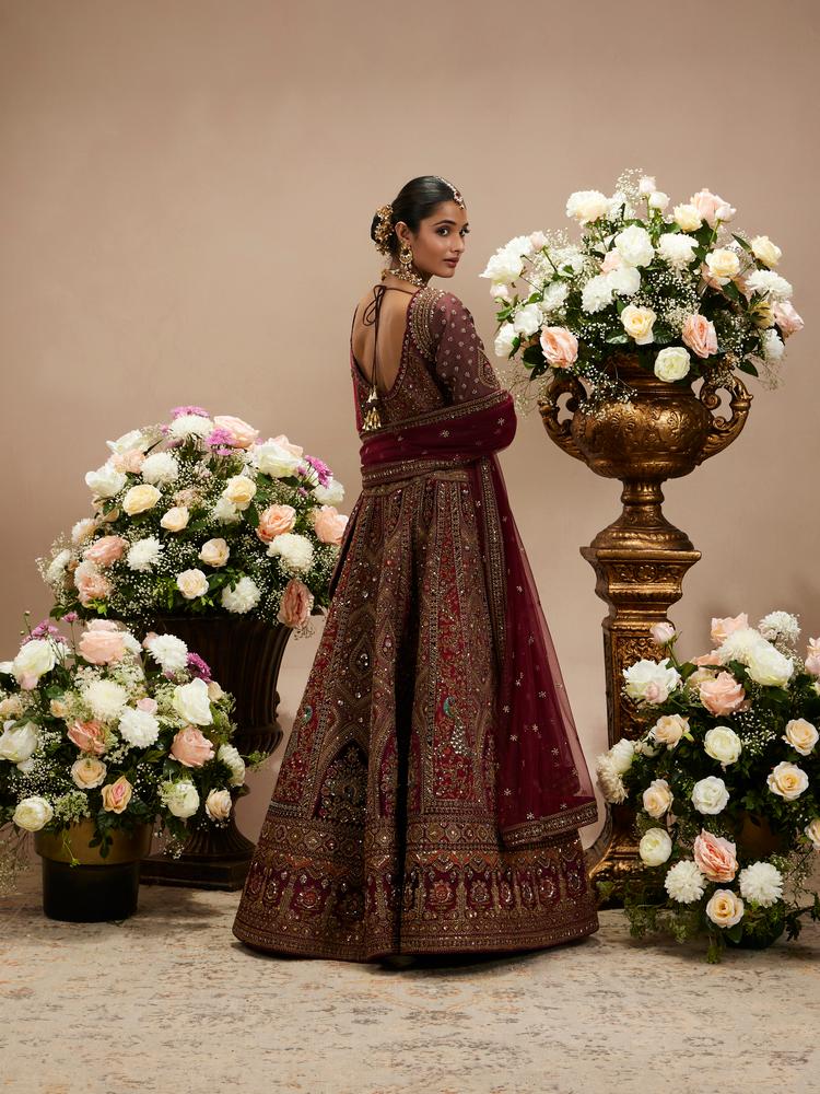 Twamev Women Maroon Red Jhallar Patterned Lehenga with Peacock And Pillow Trim Latkans
