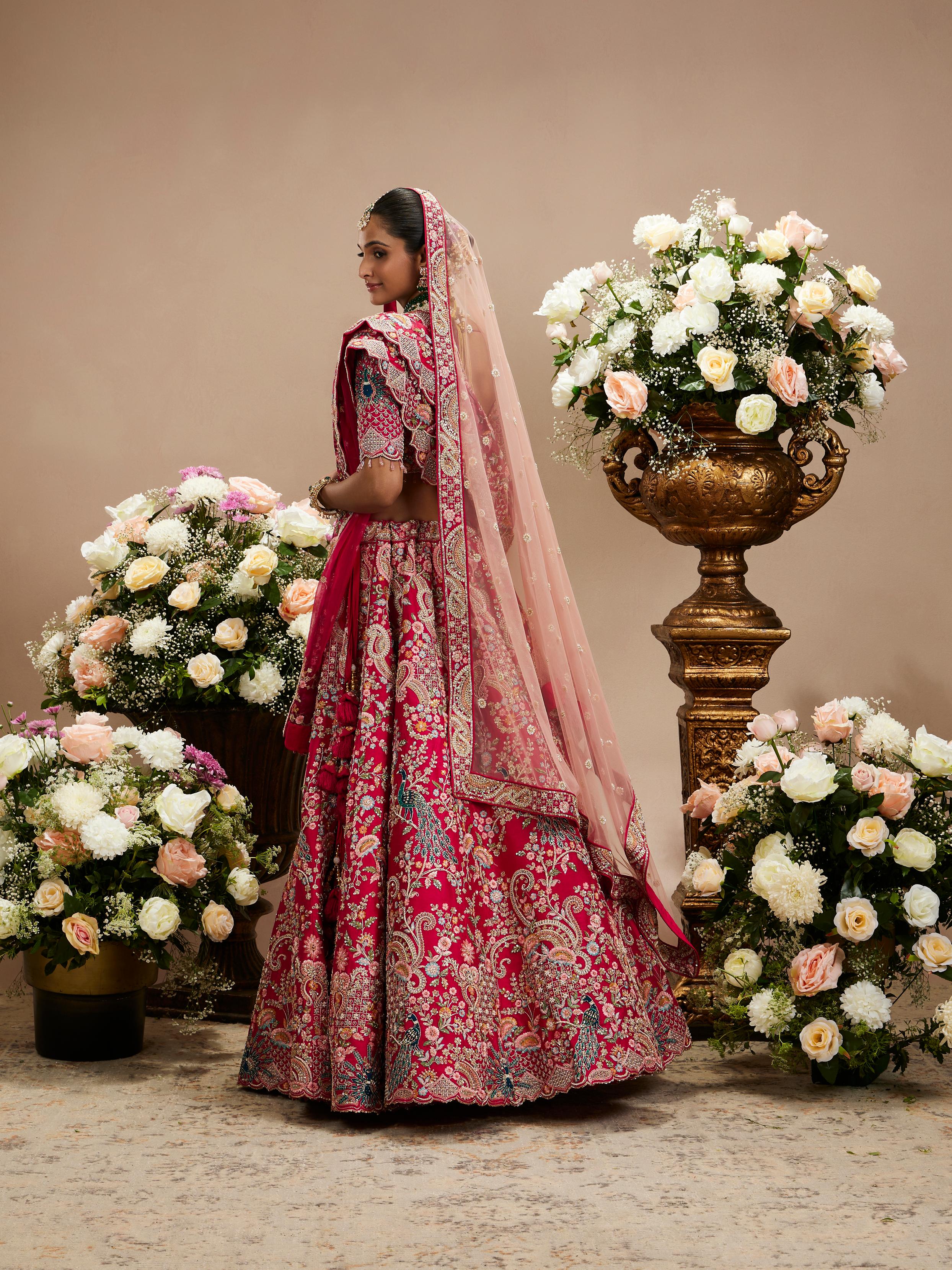 Twamev Women Carmine Red Floral Embroidered Sequinned Lehenga with Paisley And Peacock Motifs