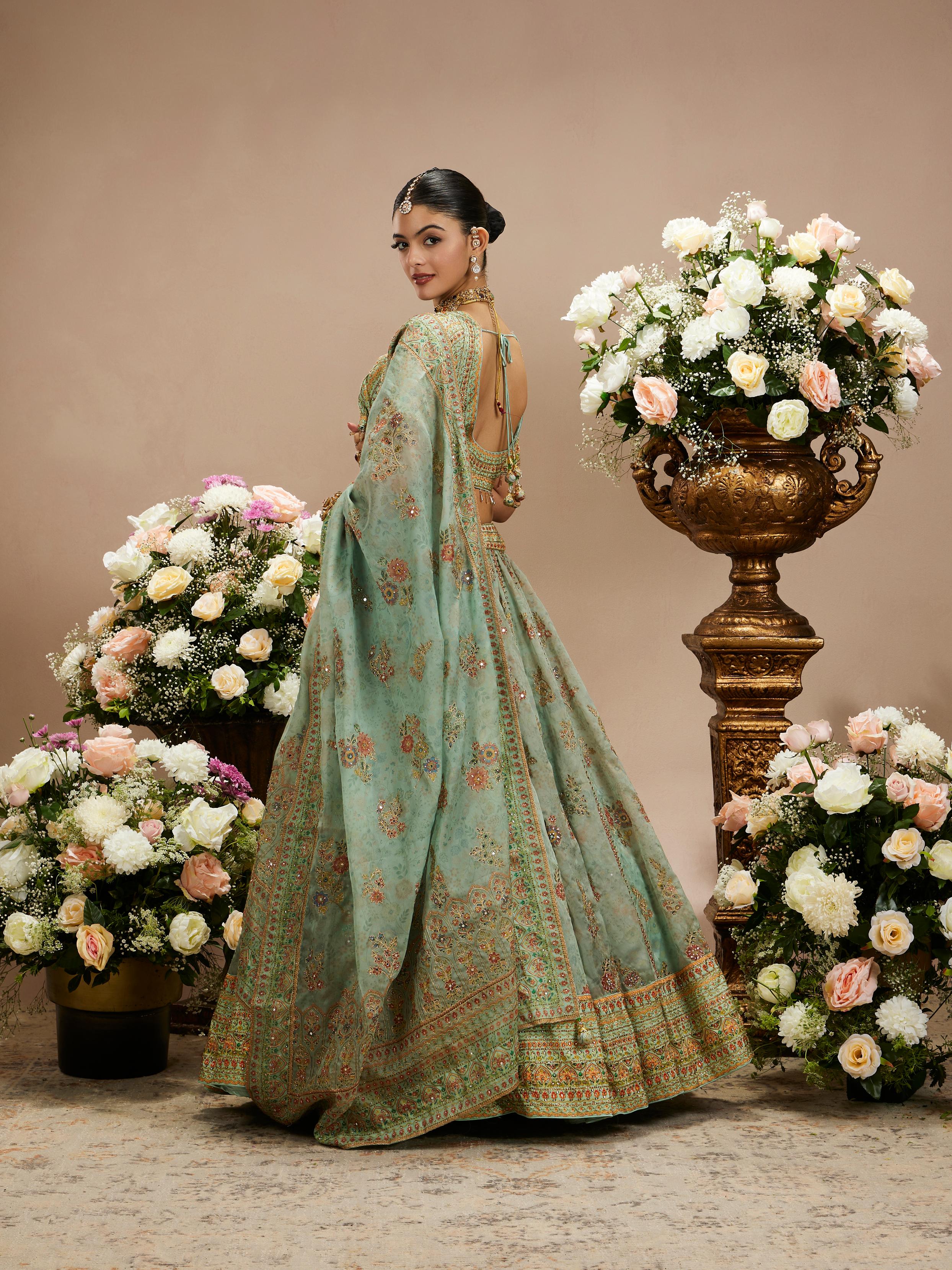 Twamev Women Sea Green Floral Embroidered Lehenga with Mirror Work And Tassled Blouse