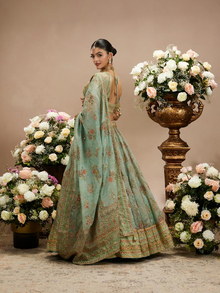 Twamev Women Sea Green Floral Embroidered Lehenga with Mirror Work And Tassled Blouse