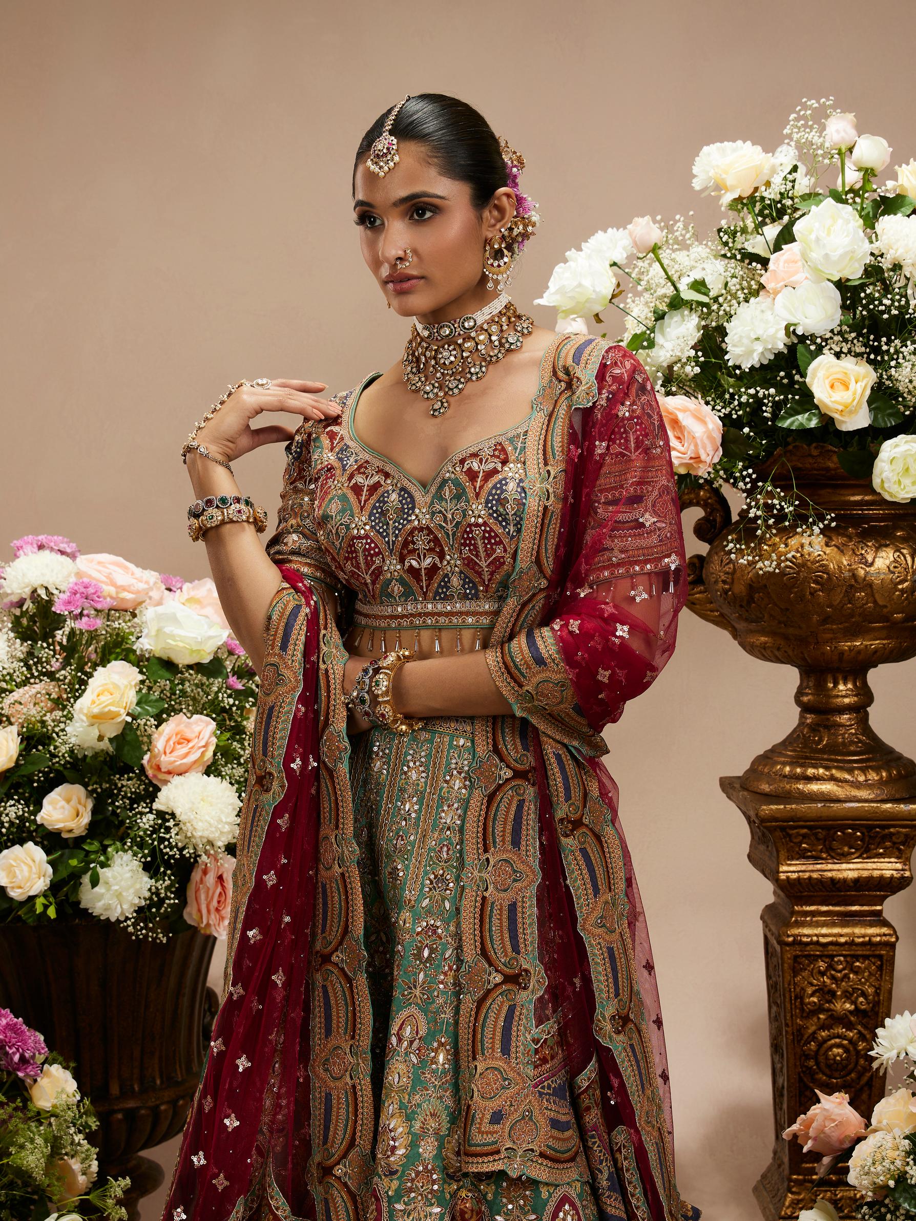Twamev Women Rama Green And Maroon Jhallar Patterned Lehenga with Buta Motifs, Zari And Gota Patti Work