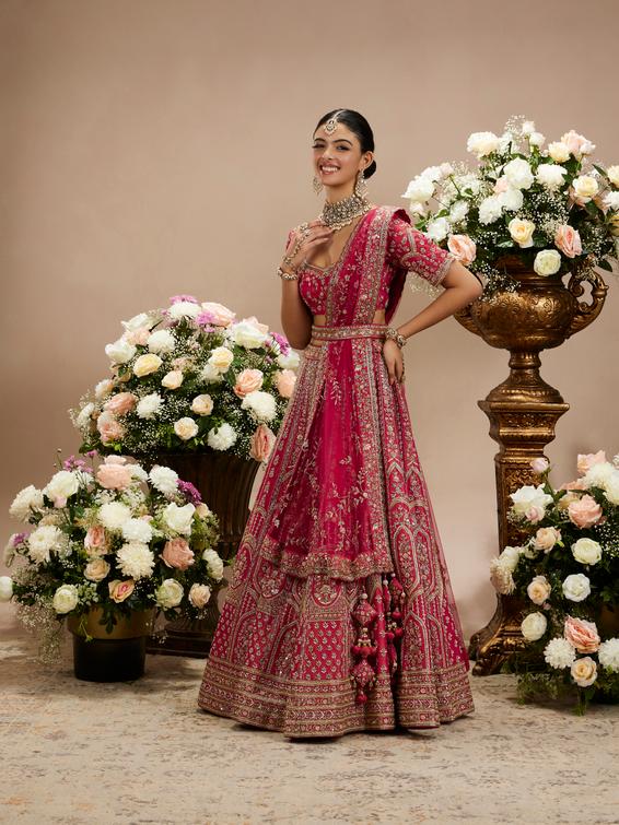 Twamev Women Rani Pink Zari Embroidered Lehenga with Floral And Buta Motifs And Pillow Trim Latkans