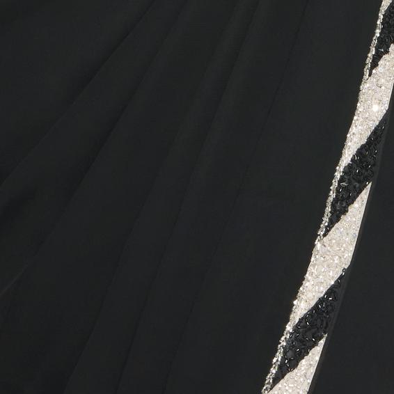 Twamev Women Black Cream Georgette Radiance Saree