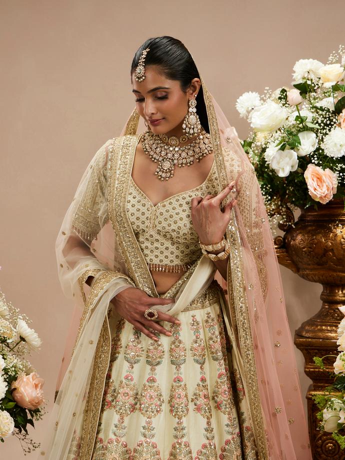 Twamev Women Cream White Jaal Patterned Lehenga with Floral Buta Motifs And Sequin Work