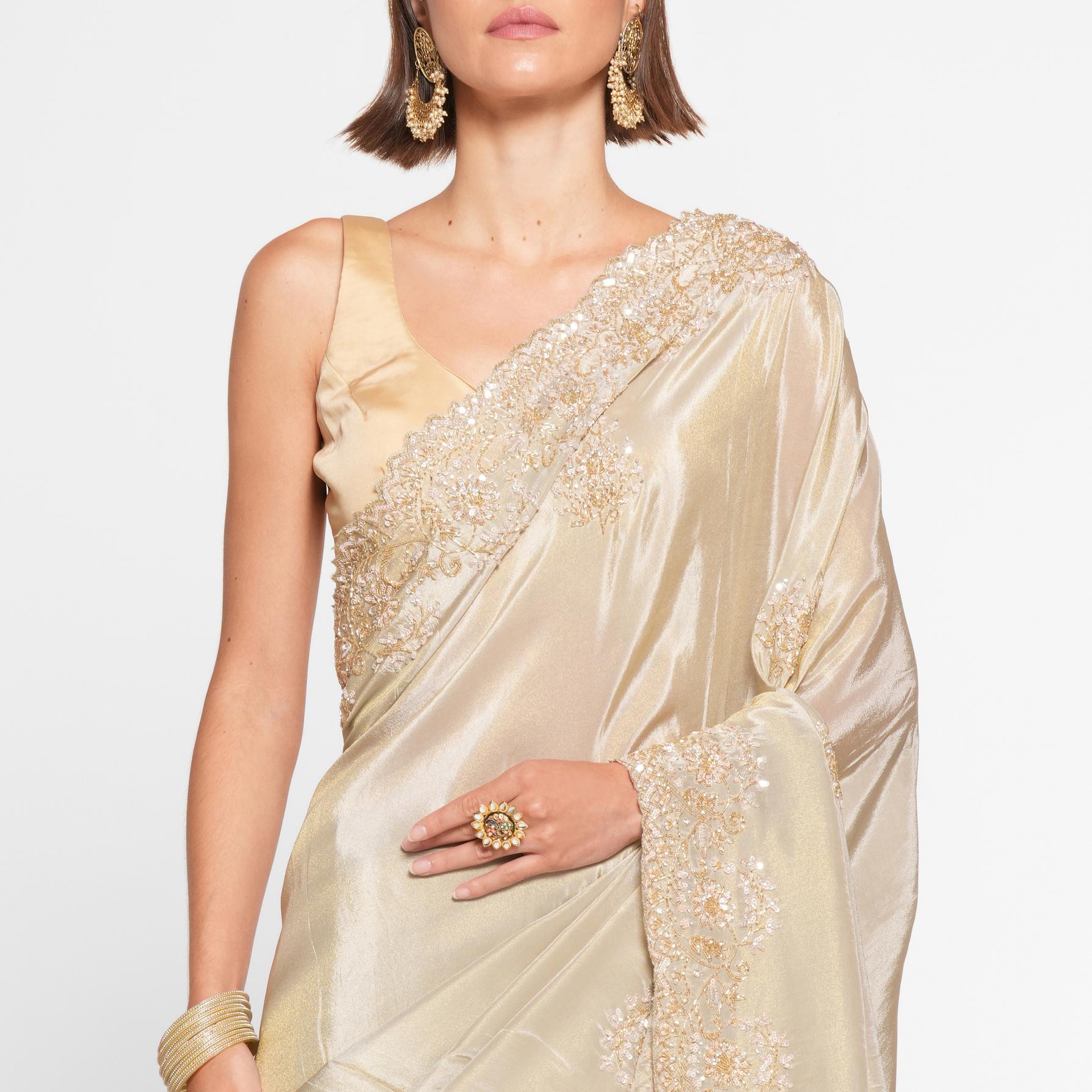 Twamev Women Elegant Cream Saree in Organza with Precise Embellishments