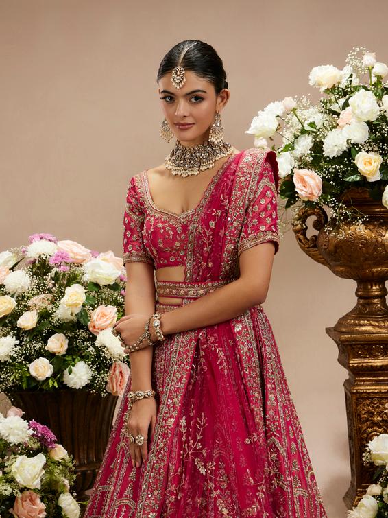 Twamev Women Rani Pink Zari Embroidered Lehenga with Floral And Buta Motifs And Pillow Trim Latkans
