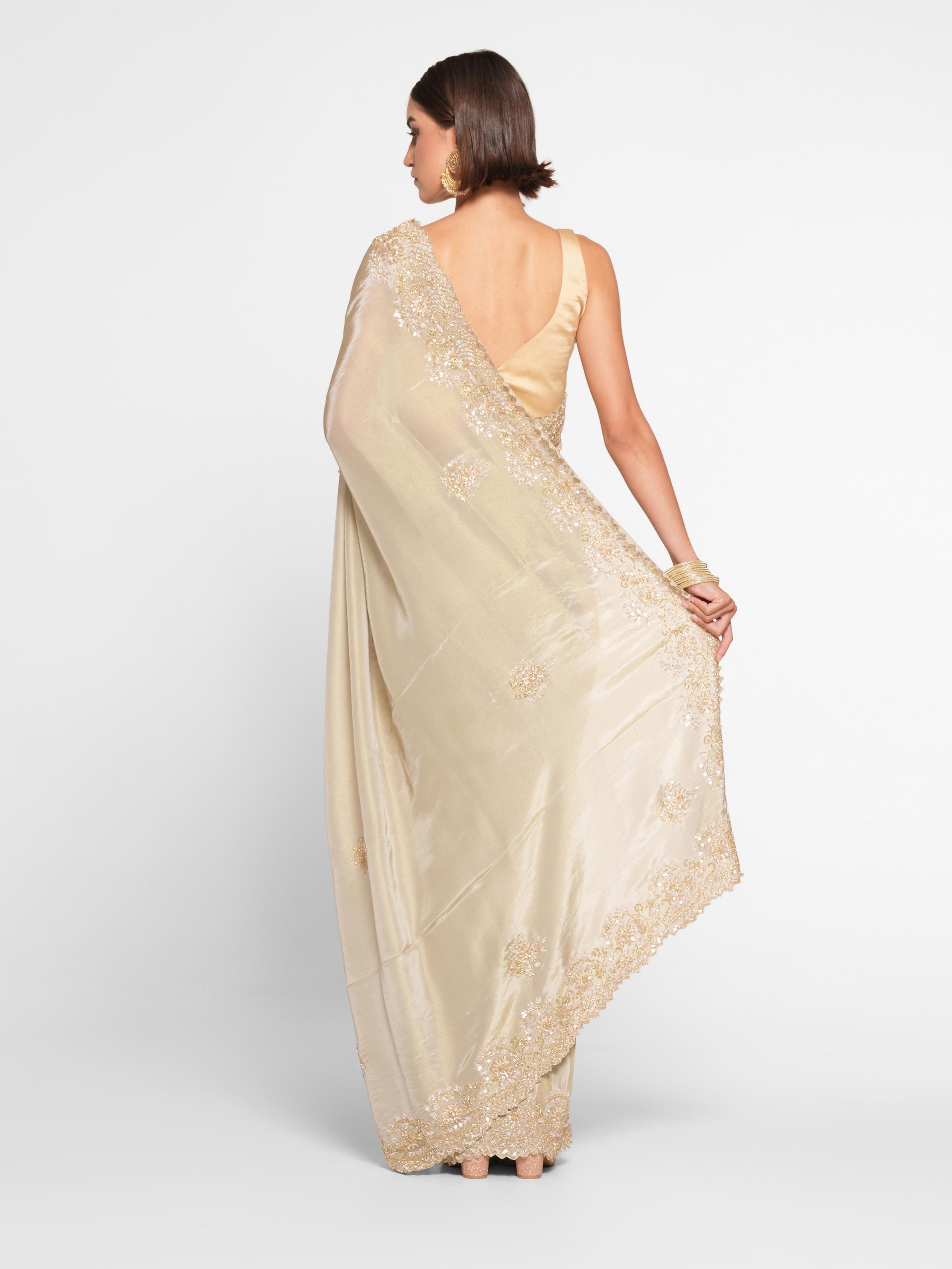 Twamev Women Elegant Cream Saree in Organza with Precise Embellishments