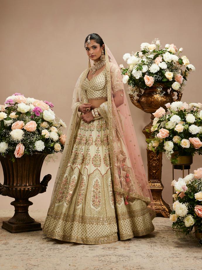 Twamev Women Cream White Jaal Patterned Lehenga with Floral Buta Motifs And Sequin Work